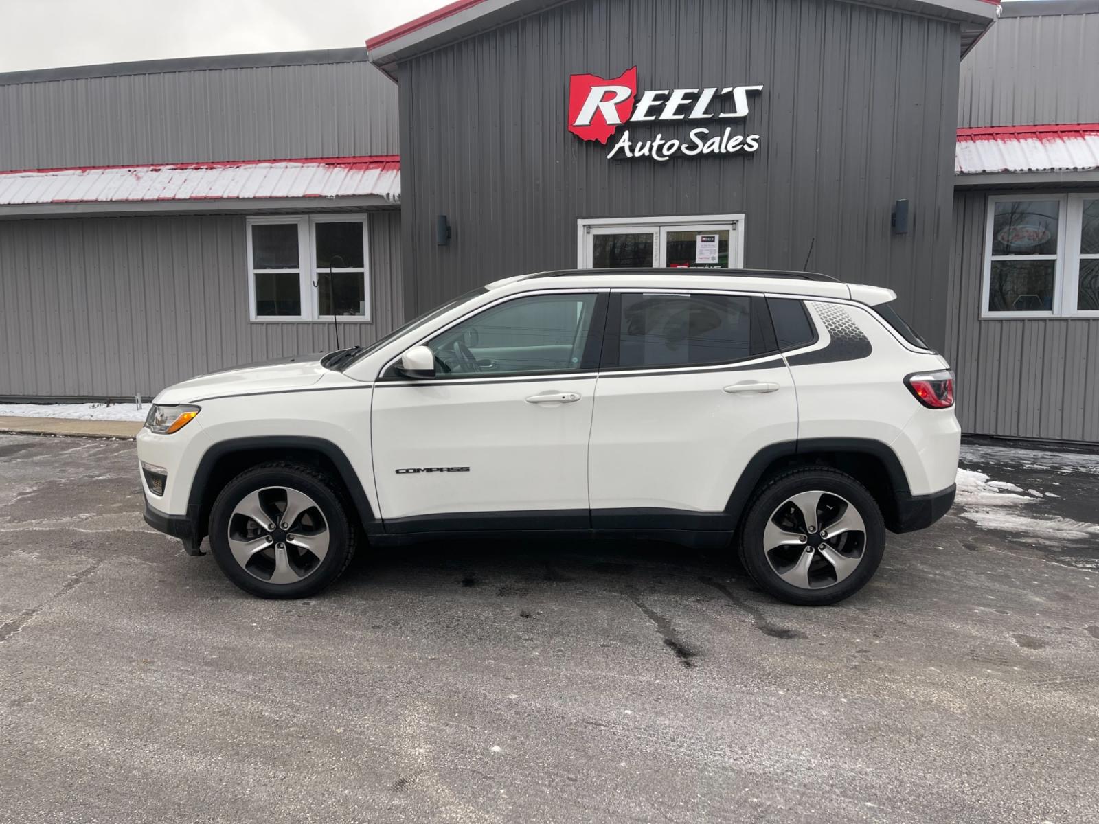 2018 White /White Jeep Compass Latitude 4WD (3C4NJDBB3JT) with an 2.4L I4 DOHC 16V engine, 9 Speed Automatic transmission, located at 11115 Chardon Rd. , Chardon, OH, 44024, (440) 214-9705, 41.580246, -81.241943 - This 2018 Jeep Compass Latitude 4WD with a 2.4-liter engine and 9-speed automatic transmission offers a blend of utility and comfort with its heated leather seats and dual-zone automatic climate control. The 8.4-inch touchscreen provides user-friendly access to navigation, Apple CarPlay, and Android - Photo #15